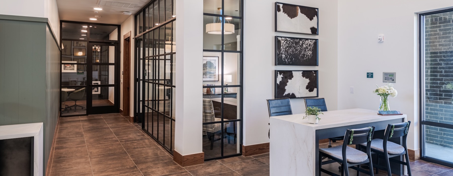 a room with a table and chairs